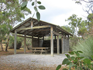 Picnic shelter with water tank