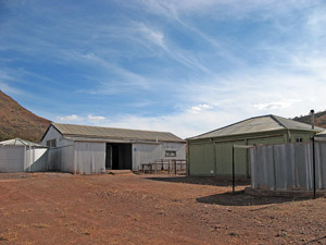 Rear of hut (right) with shearing shed beyond (left)