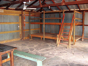 Interior of hut showing bunks