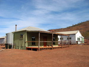 Hut with shearing shed beyond