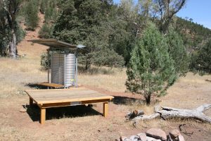 Camping platform and water tank.
